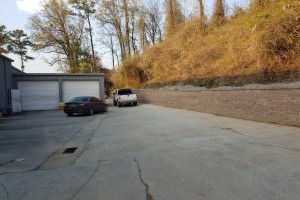 02_retaining_wall_behind_expressoilchange.jpg