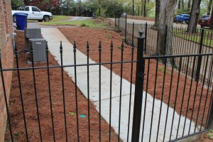 Concrete side walk, iron fence and stairs installations in Birmingham, Al